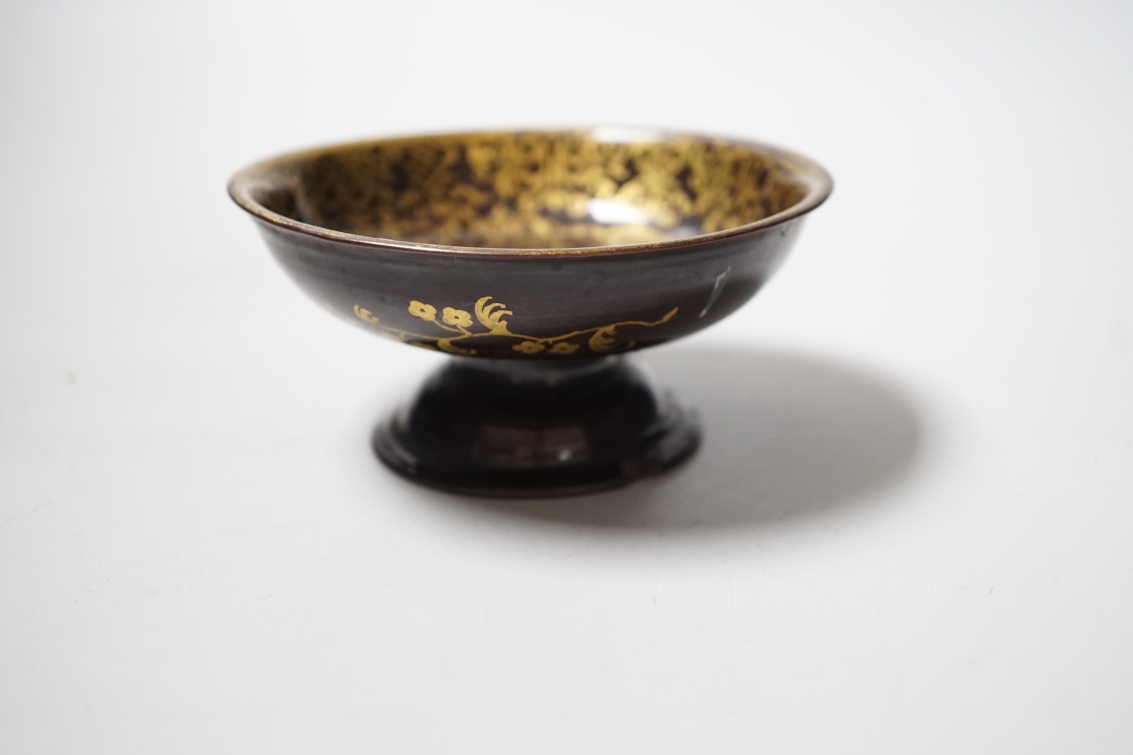 A Bayreuth glazed and gilded footed dish, c.1730-40, in imitation of Böttger stoneware, 11.2cm diameter, foot glued